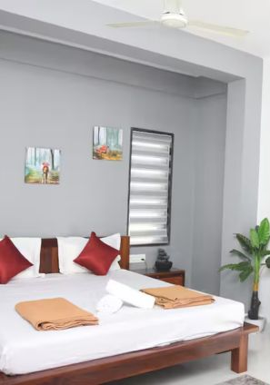 Luxury Master Bedroom King Bed Devyani Villa Goa / Spacious 4BHK villa bedroom with attached balcony and valley view / Elegant interiors of a Goa luxury villa bedroom
