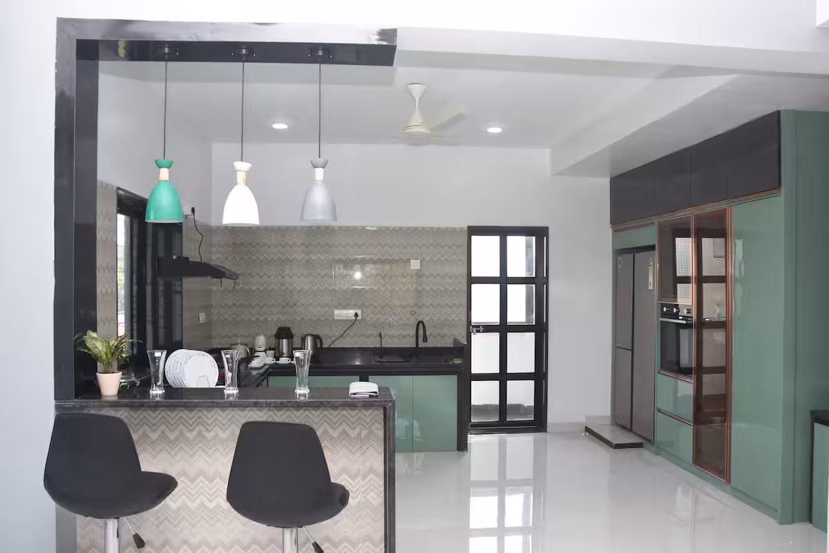 Fully equipped private kitchen for self-cooking Devyani Villa / Modern dining area in luxury 4BHK Goa villa / In-house chef preparing customized meals in villa kitchen